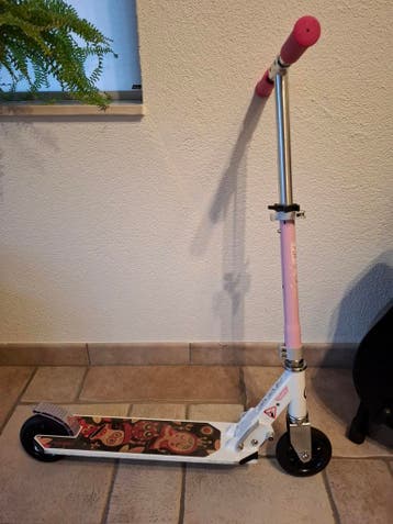 Roze Oxelo kinderstep geschikt voor 5 tot 9 jaar