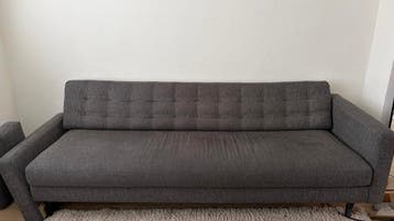 Comfortabele grijze slaapbank - Gebruikt