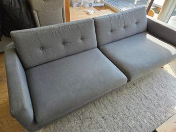 Comfortabele grijze bank