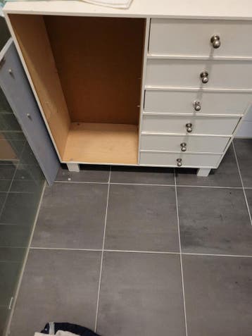 Wit dressoir met lades en kastje