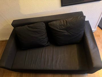 Zwarte bank met opslagruimte