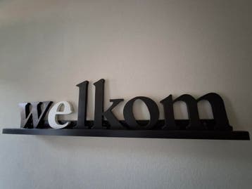 Wandrek met letters W E L K O M