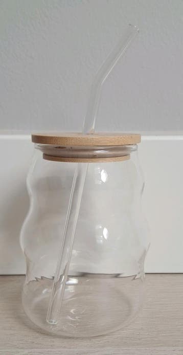 Drinkglas met rietje