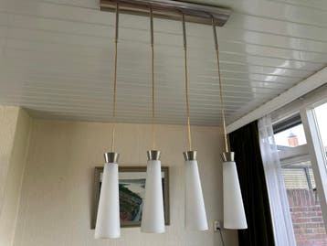 Moderne hanglamp met 4 glazen kappen