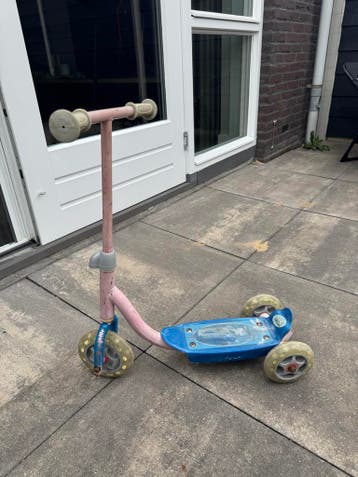 Roze kinderstep met 3 wielen