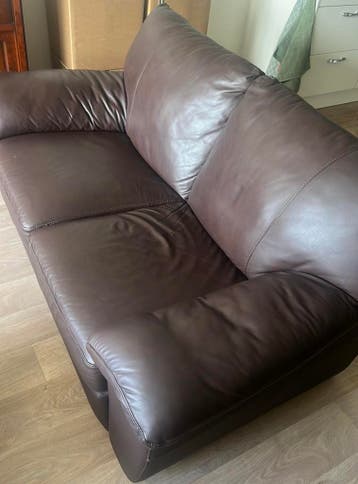 Donkerbruin Ikea bank 86 cm diep en 148 cm breed