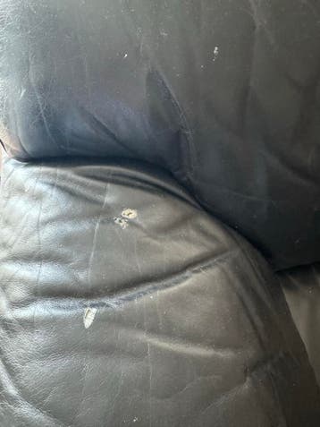 Zwarte leren tweezitsbank - Gebruikt