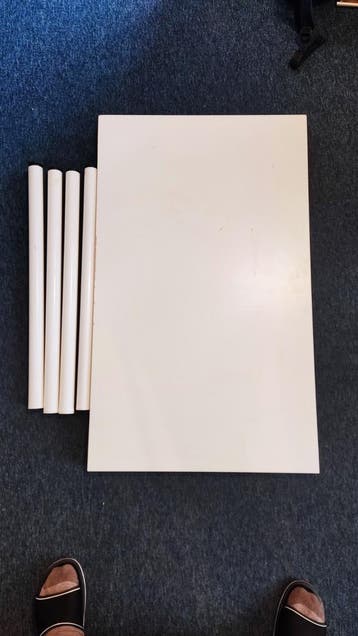 White Ikea table with 4 legs.