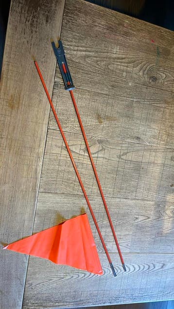 Oranje fietsvlag met stok