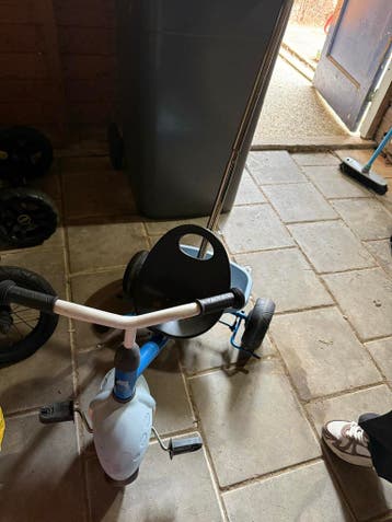 Driewieler fiets met loopstang