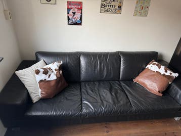 Gratis zwart lederen bank