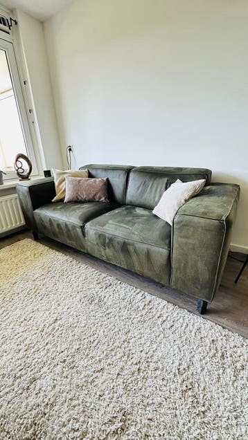 Groene twee en half zits bank