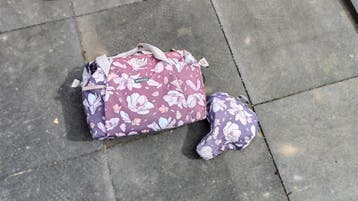 Gratis: Fietstas en zadelhoes (verkleurd)