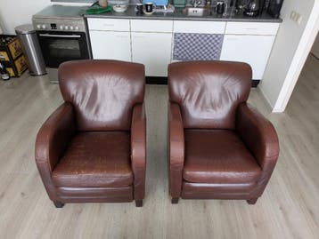 Bruine leren stoelen 2st.