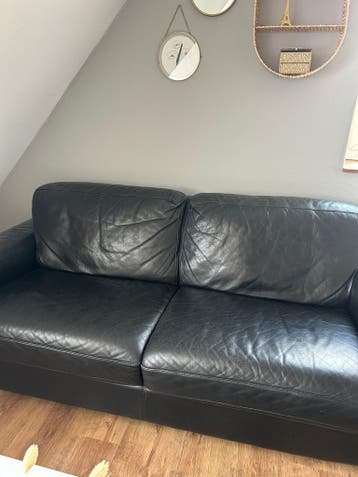 Zwarte leren tweepersoonsbank