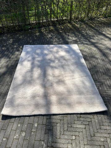 Creme vloerkleed gratis