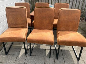 Zes leren eettafel stoelen