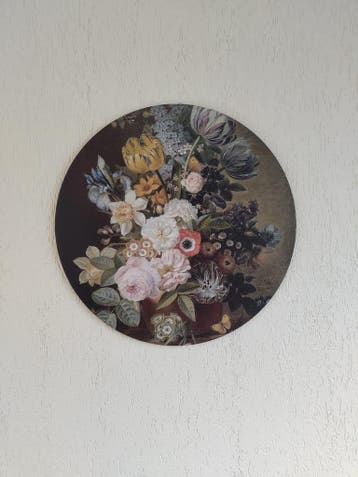 Rond schilderij met bloemen