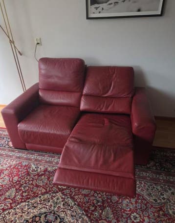 Rode bank met uitschuifbaar zit- naar ligdeel