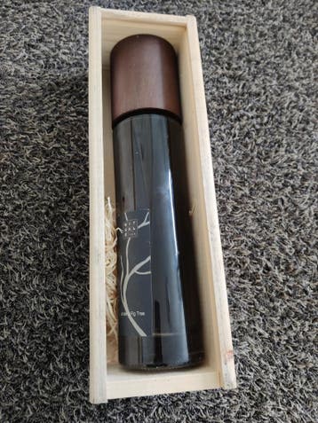 Lege Rituals Under a Fig Tree fles in houten kistje