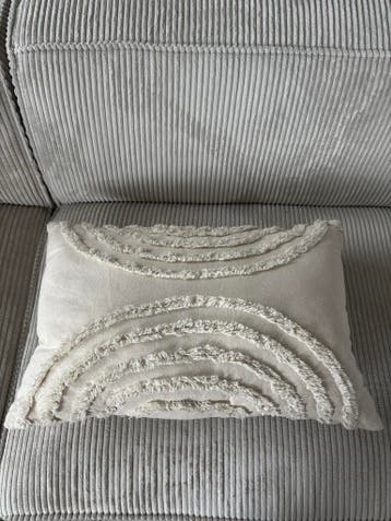 Kussen met boogpatroon