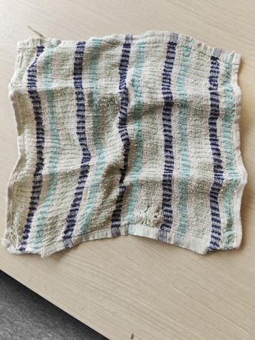 Gebruikte theedoek met strepen