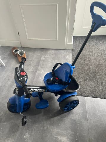 Driewieler met duwstang