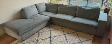 Blauwgrijze hoekbank, 296x245cm, hoezen wasbaar