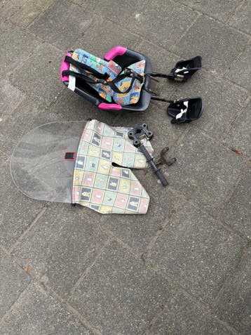 Gratis! Goed gebruikt fietsstoeltje voor voorop.