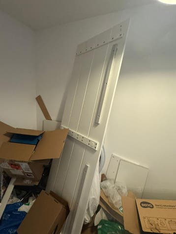 Exercise bike + IKEA NORDLI headboard + PAX sliding doors