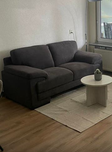 Mooi, stevig en goed onderhouden 2-zits bankstel antraciet