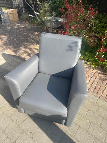 Grijze fauteuil gratis