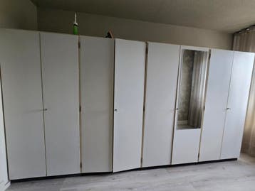 witte kledingkasten met spiegel