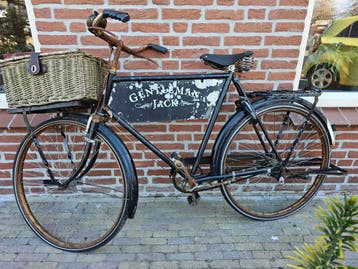 Oude fiets met mand ter decoratie - Vintage look