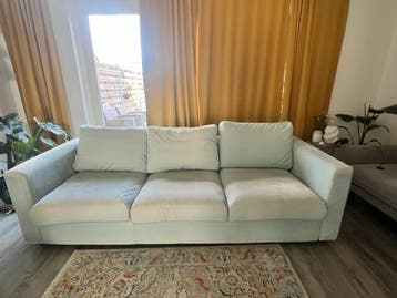 Lichtblauwe driezitsbank