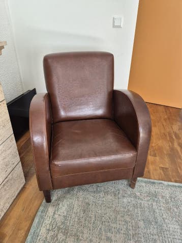 Bruine fauteuil