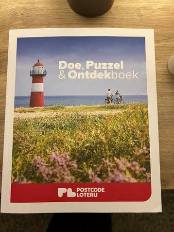 Gratis Postcode loterij boek puzzel en ontdek