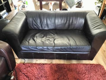Leren tweezitsbank met spoor