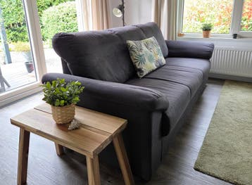 GRATIS af te halen drie zits bank grijs