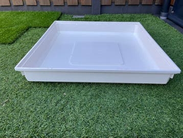 Lekbak voor wasmachine gratis