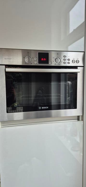 Gratis Bosch combimagnetron oven (haperend contact)