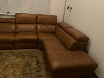 Degelijke 4 zits hoekbank.