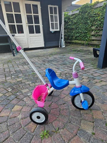 Kinder driewieler met duwstang - roze/blauw