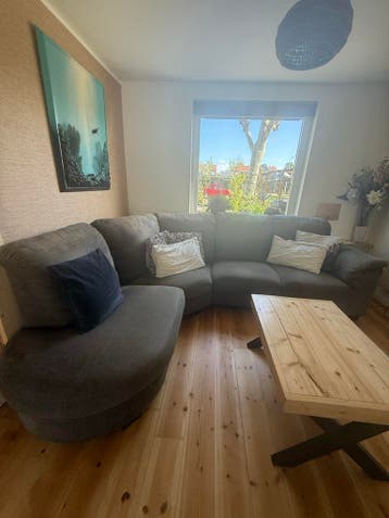 Halve ronde donkergrijze hoekbank