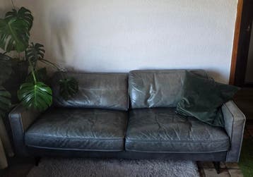 Gratis Donkergroene leren bank.