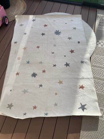 Crèmekleurig vloerkleed met sterren