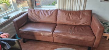 Gratis af te halen: Lederen bank met scheur in bekleding