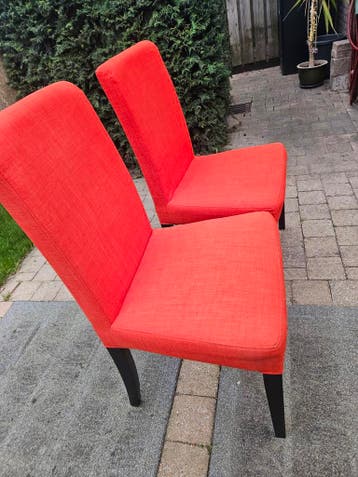 Set van 2 rood oranje eetkamerstoelen (ikea)