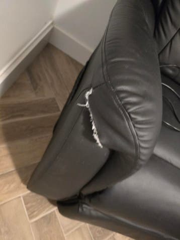 Zwarte relaxstoel met afstandsbediening