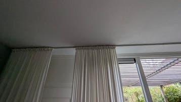 Gratis gordijnrail en eventueel gordijnen